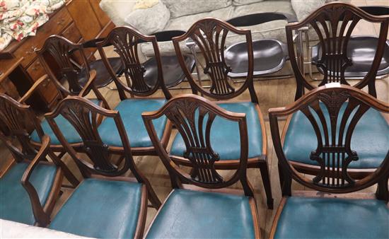 A set of eight Hepplewhite design mahogany shield back dining chairs (two with arms)